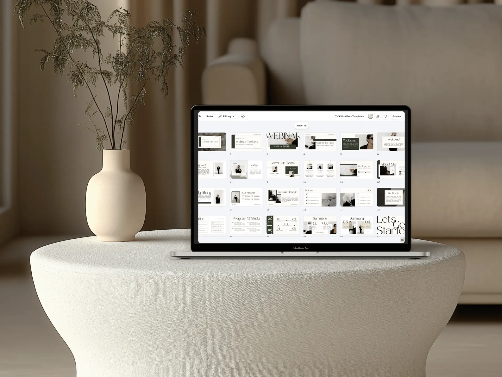 A laptop showing branded slide deck templates from the content studio