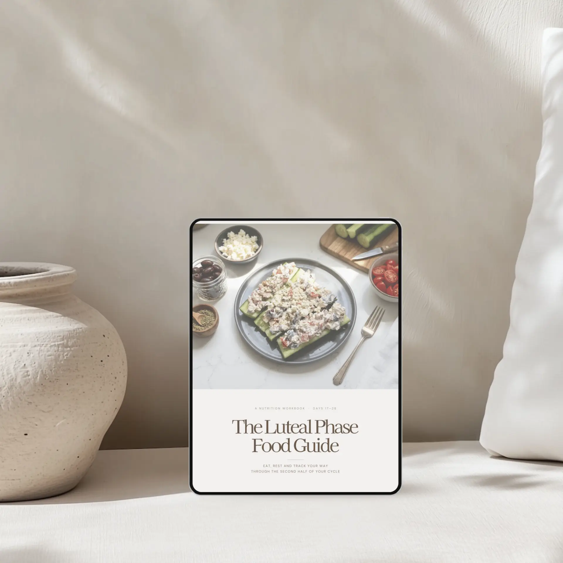 Luteal phase food guide workbook on a tablet